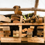 LandWorks quotes burnt into wood. Photo Credit: Recourse Magazine